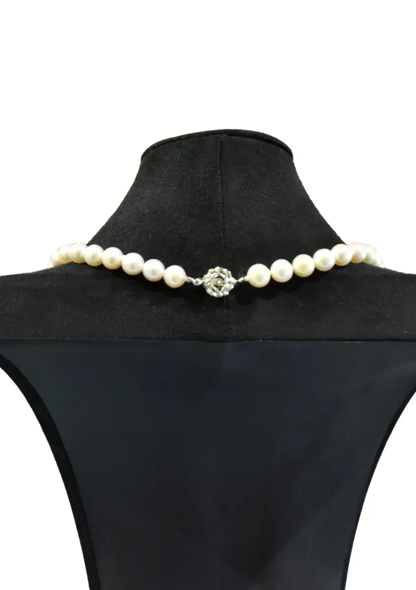 Урт сувдан зүүлт