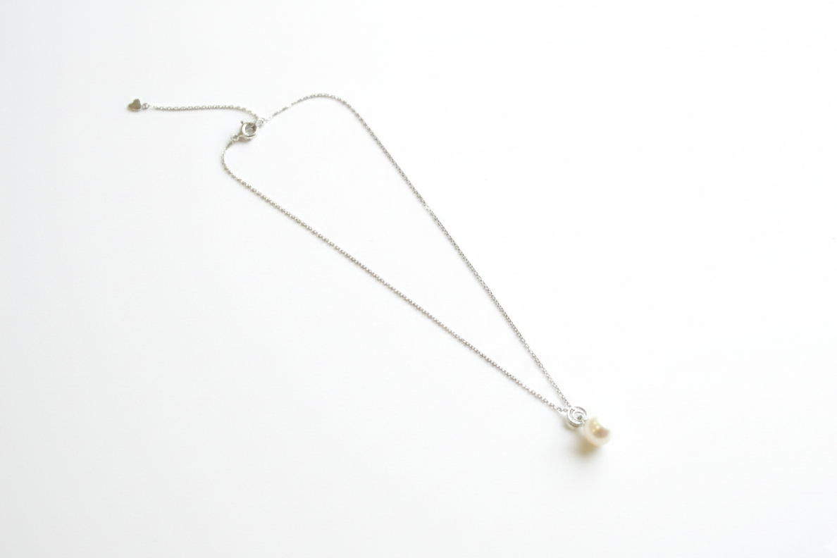 Сувдан кулон